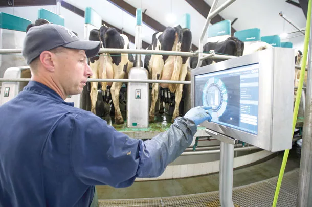 John Kampman monitors automatic rotary parlour