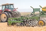 Tractor planting seed