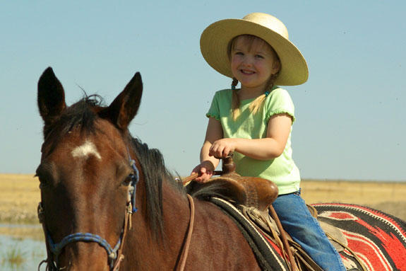 Little girl on her horse