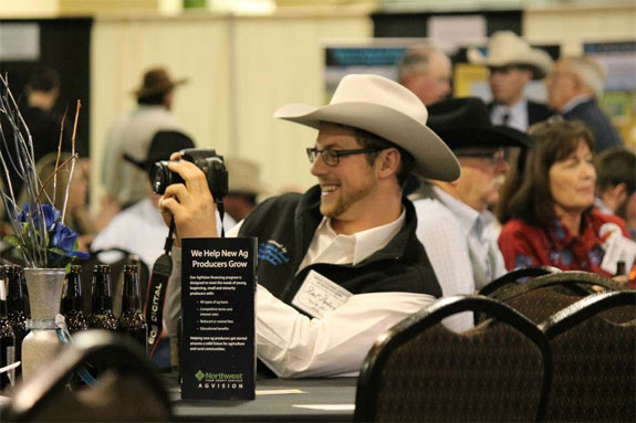 Steel Anderson taking pictures at the convention