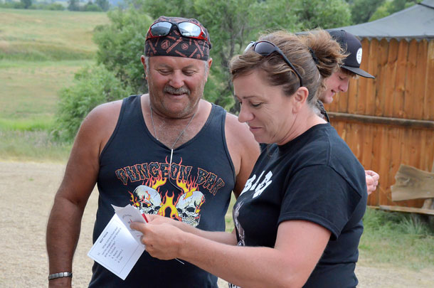 Kodi Blotsky visits with biker