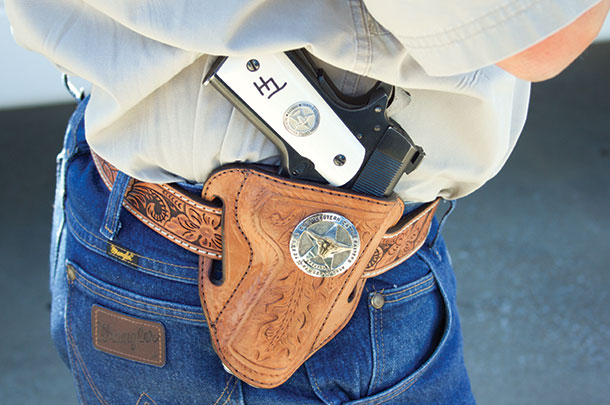 Tony Hurley’s cattle brand is engraved into the sidearm’s ivory grip along with the TSCRA badge.