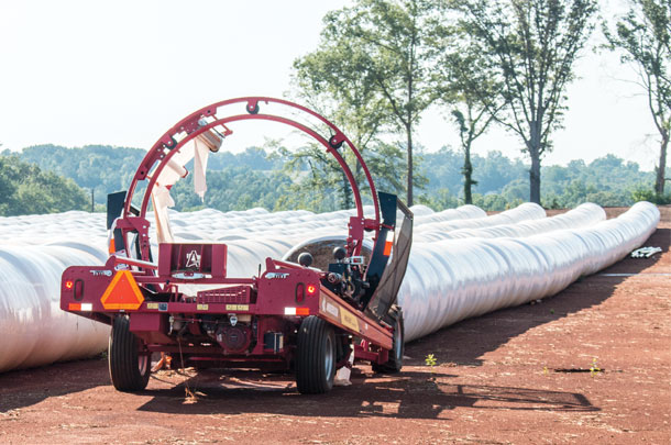 cuts and wraps bales