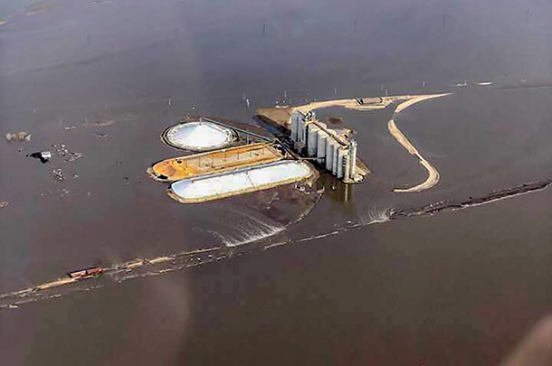 Farm buildings, grain elevators and other structures under water