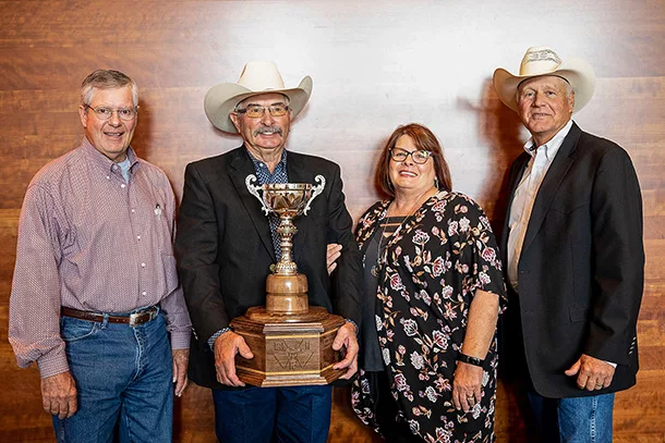 Greg Henderson, Drovers, award sponsor; Kent and Jean Brunner, Cow Camp Ranch; and Joe Mushrush