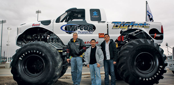 Companies rolled out their larger-than-life displays, including this cow-spotted monster truck from Vi-COR