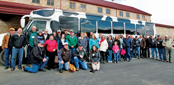 Producers from both states mixed together on two buses at Fair Oaks before heading to other dairy farms in the Hoosier state on March 25. 