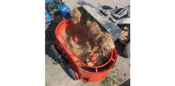 loading silage into mixer