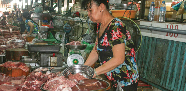 woman selling meat