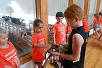 060815 jack showing kids a milking machine