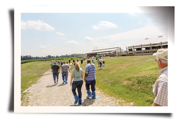 people touring dairy