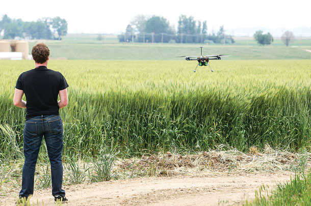man flying a drone