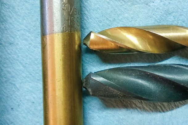 Top sharpened with the heel higher than the cutting edge, lower is a new bit