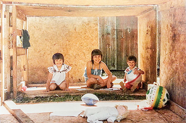 Playing house in a calf hutch