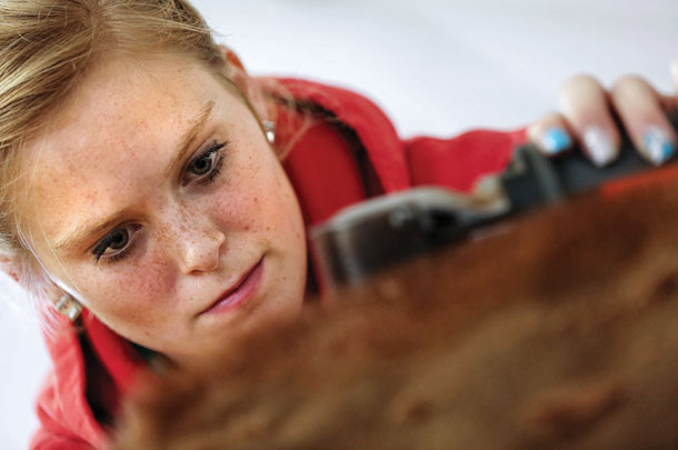 Olivia Brandenburg clipping cow