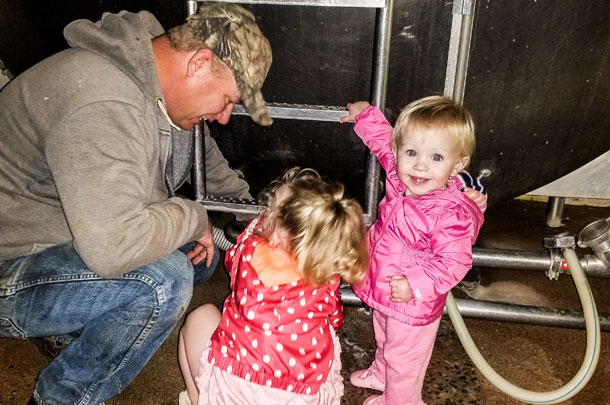 Baler and Kemper help milk cows