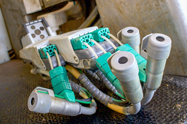 robotic milking arm on rotary parlor
