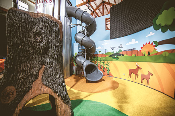 An interactive experience is an indoor two-story slide