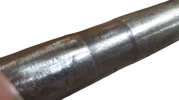 A worn area is shown on a shaft