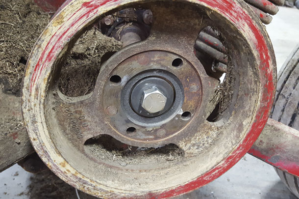 This pulley came off by just tightening the two bolts through the pulling bar and through the pulley.