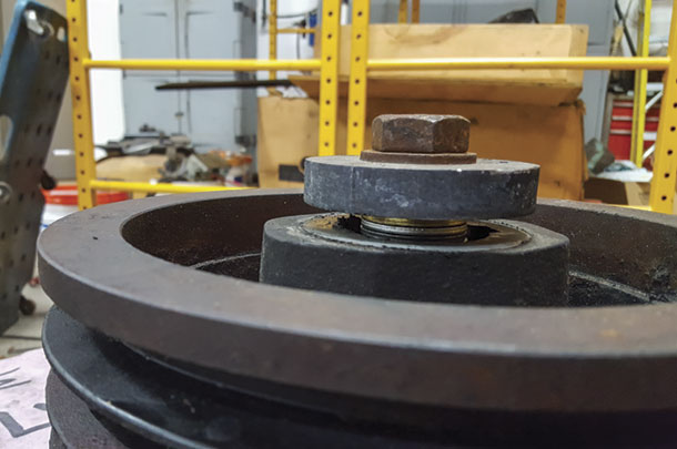 Install the bolt and washers and tighten the bolt