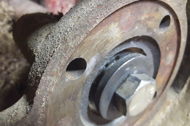 A hub which bolts to the pulley is removed