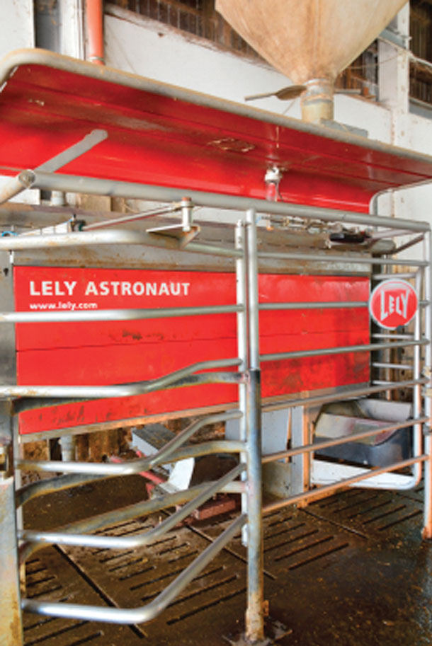 Dummu robotic milking boxes that have no robotic arms and only grain feeders