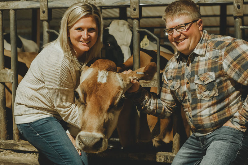 Megan Kregel @megan_dairygirl. Megan Kregel and Ted McAllister pose with TikTok star Sparkle, the Jersey Cow.