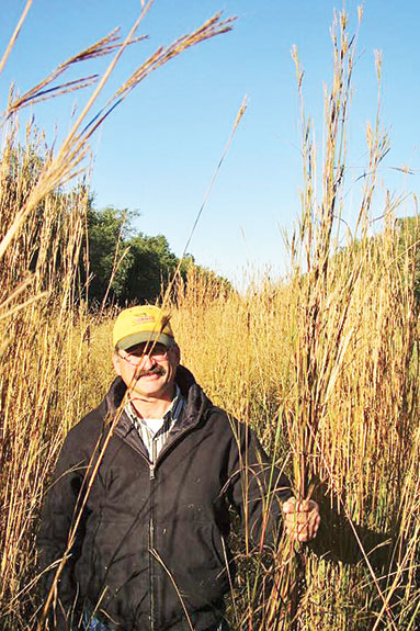 Jim Kopriva standing in a pasture