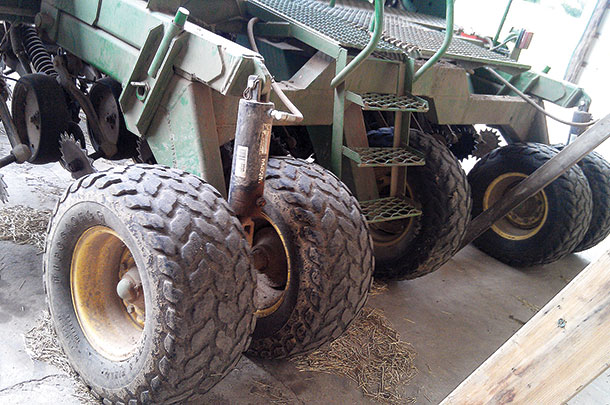 Four heavy-duty rear tires receive weight