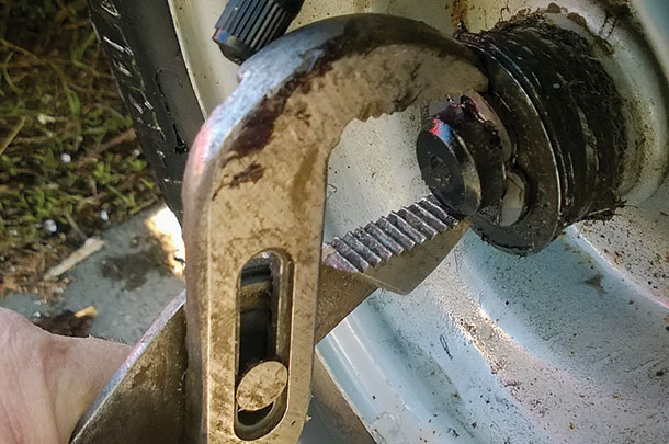Use a water pump plier to install the snap ring