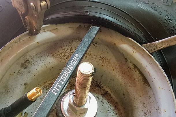 pry one side of tire the other the other side must be in the drop center
