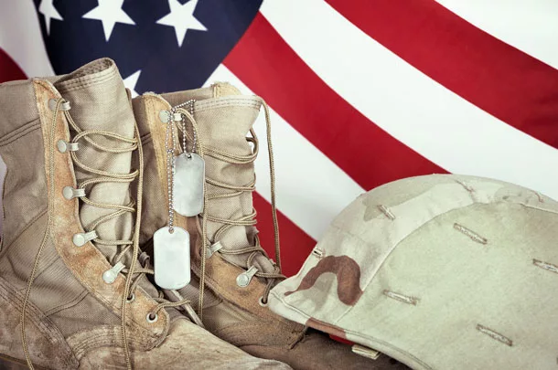U.S. flag, boots and helmet