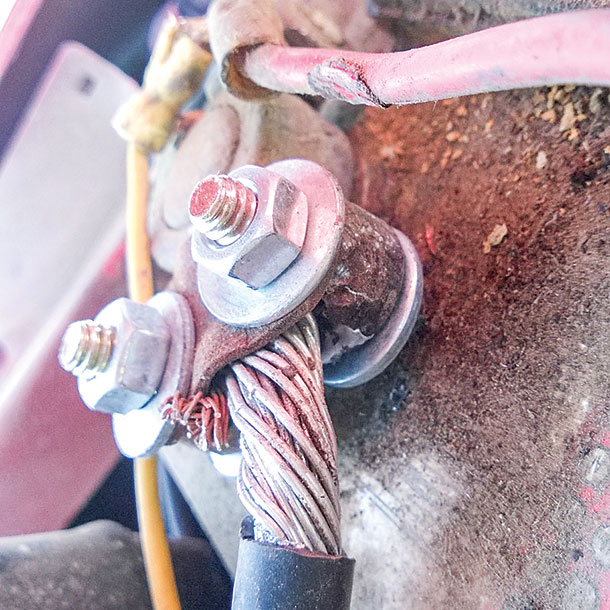 corrosion or a mess of dirt around battery cable end is a potential trouble sign