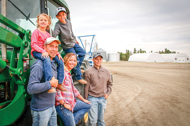 Jillien and Tyler Streit from Chester, Montana, with their family