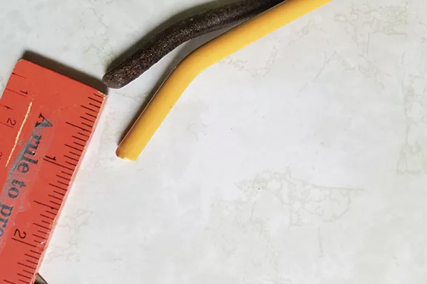 New rake tooth (yellow) to used rake tooth (brown)