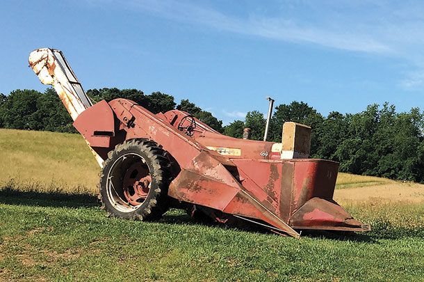 A 450 Farmall hitched to a 234 International Harvester