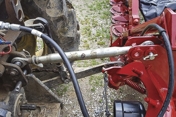 Install the center top link and teh hydraulic hose