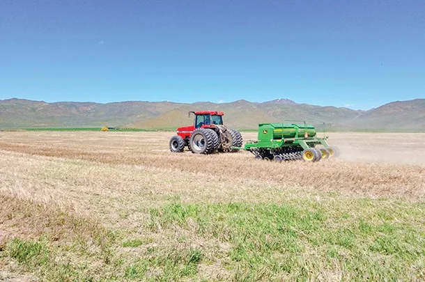 Tractor no-tills cool-season cover crop mix