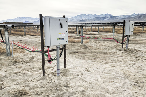 PV comviners and DC wiring are shown shortly after installation