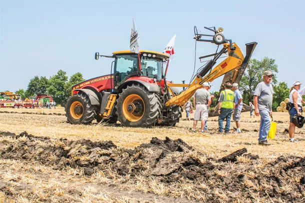 Pull-behind tile plow